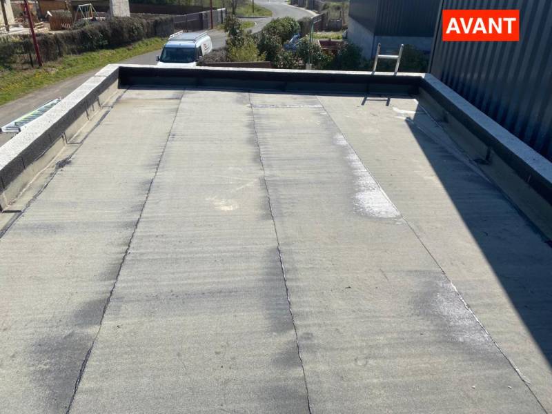 Réfection complète de l'étanchéité d'une toiture de garage : pose de couvertines et création d'une évacuation d'eau pluviale